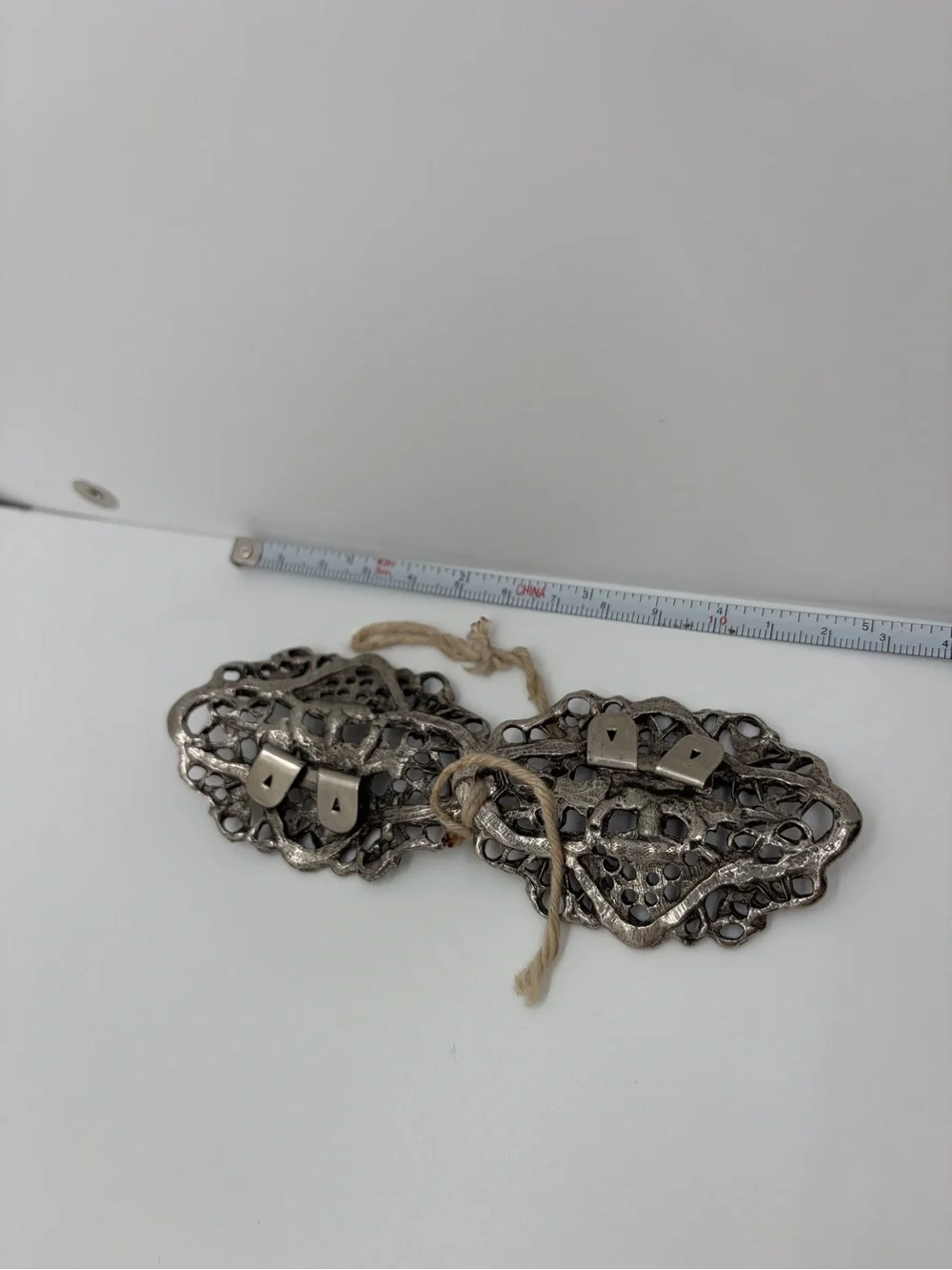 Vintage silver tone molded floral shoe clips